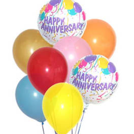 Cluster of colorful balloons with two "Happy Anniversary" balloons