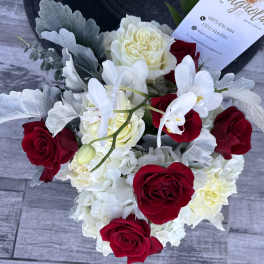 Bouquet of red and white roses with white orchids