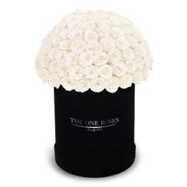 White rose bouquet in a black cylindrical box
