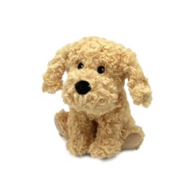 Plush tan dog toy sitting on a white background