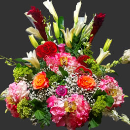 Colorful mixed bouquet with roses, lilies, and hydrangeas