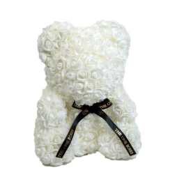 White rose teddy bear with a black ribbon bow