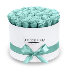 Round box of turquoise roses with a satin ribbon
