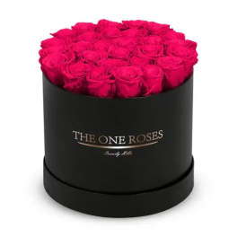Round box of bright pink roses with a black container
