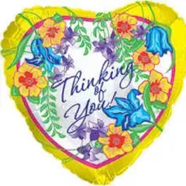 Heart-shaped balloon with flowers and "Thinking of You" text