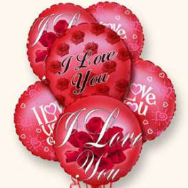 Cluster of red heart-shaped balloons with love messages
