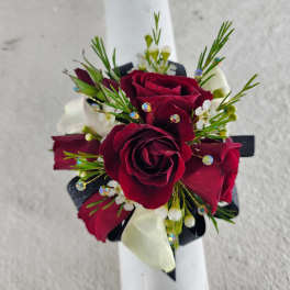 Red Hot Prom Corsage offering three options of flowers - Red roses, Orchids and Calla Lilies