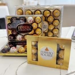 Boxes of Ferrero Rocher chocolates on a table