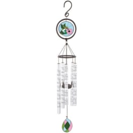 Hanging metal wind chime with clear tubes and stained-glass style floral medallions in blue, pink, and green.