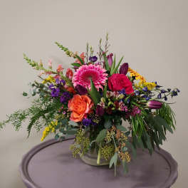 Colorful mixed bouquet in a clear glass vase