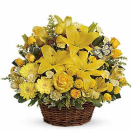 Yellow floral basket arrangement with lilies and roses