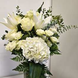White arrangement with white roses