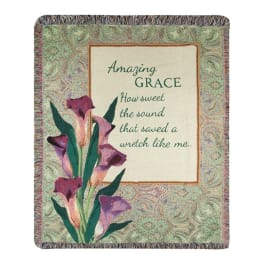 Decorative blanket with calla lilies and the words Amazing Grace