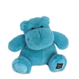 Blue plush hippo toy sitting on a white background