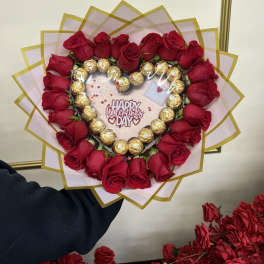 Heart-shaped rose bouquet with Ferrero Rocher chocolates and a Valentine card