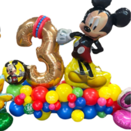 Mickey Mouse balloon display with a gold number 3 and colorful balloons