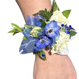 Blue and white wrist corsage with ribbon and beads