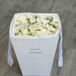 White ranunculus bouquet in a white gift box