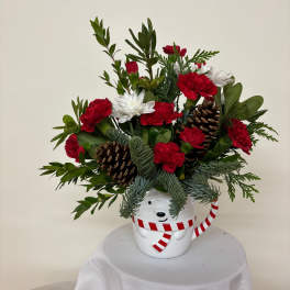 Holiday bouquet in a white mug with candy cane stripes