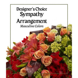 Designer’s Choice Sympathy Arrangement with roses, lilies, and red blooms