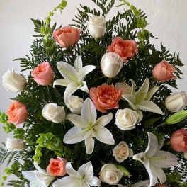 Standing floral spray with white lilies and peach roses