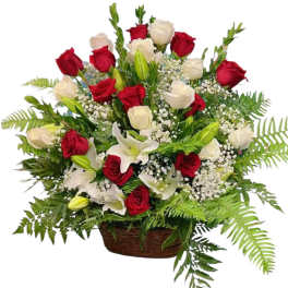 Basket arrangement of red and white roses with lilies