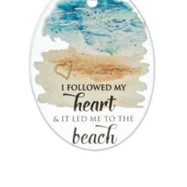 Oval beach-themed hanging ornament with watercolor ocean art and heart quote text