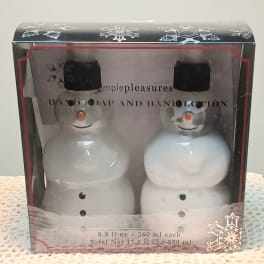 Two snowman-shaped hand soap bottles in a holiday gift box