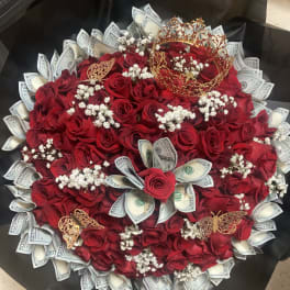 Bouquet of red roses with dollar bills and gold butterfly accents