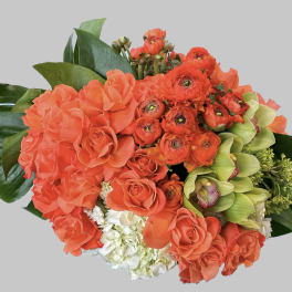 Bouquet of orange roses, ranunculus, and green orchids