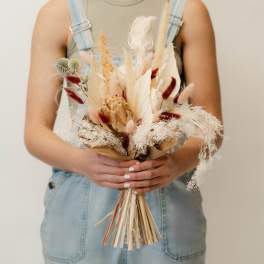 Dried bouquet with cream, red, and tan textures