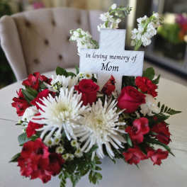 Red and white floral arrangement with a memorial cross for Mom