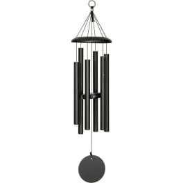 Black metal wind chime with hanging tubes and a round striker