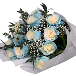Bouquet of pale blue and cream roses with baby's breath