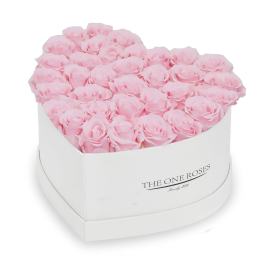 Heart-shaped box of pale pink roses