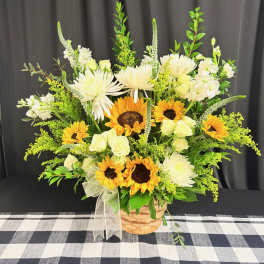 Basket arrangement of sunflowers, white roses, and white daisies