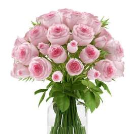 Bouquet of pale pink roses in a clear glass vase