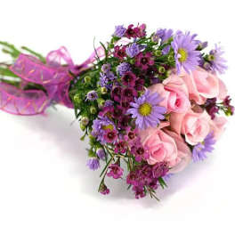 Bouquet of pink roses and purple daisies tied with a pink ribbon