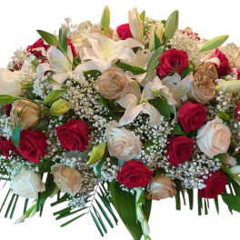 Large bouquet of red and white roses with lilies and baby's breath