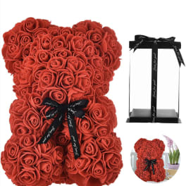 Red rose teddy bear with a black ribbon and gift box