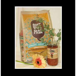 Snack bag, salsa jar, and a gerbera daisy with eucalyptus sprigs