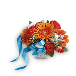 Orange and red flower bouquet with blue ribbon