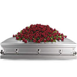 Red rose casket spray on a silver casket