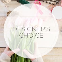 Round designer's choice floral arrangement with pale pink tulips