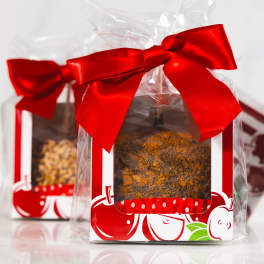 Gift boxes tied with red bows and wrapped in clear plastic