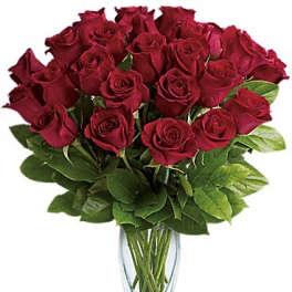 Bouquet of red roses in a clear glass vase