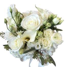 White rose and calla lily bouquet with a satin ribbon