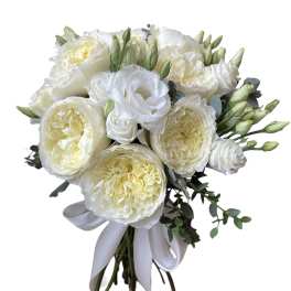 White and cream bouquet of roses and lisianthus tied with a white ribbon