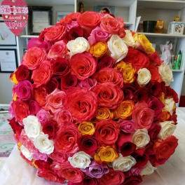 Large round bouquet of multicolored roses