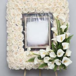White rose and calla lily funeral frame arrangement